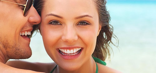 Woman smiling after receiving porcelain veneers in Scottsdale, AZ.