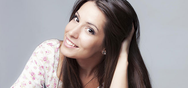 Dental Implants Woman smiling with dental implants from Scottsdale Dentist Dr. Lewandowski